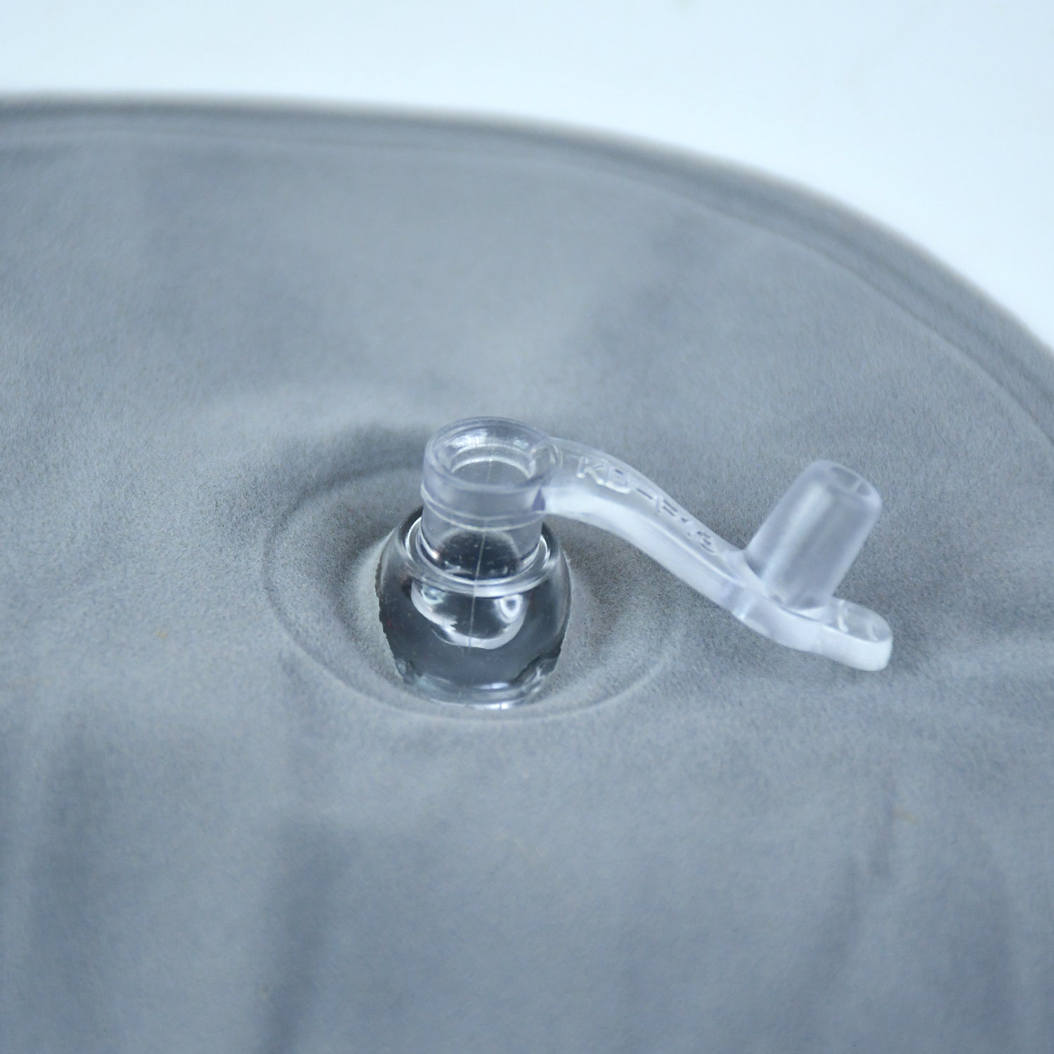 Close-up of features on inflatable travel pillow