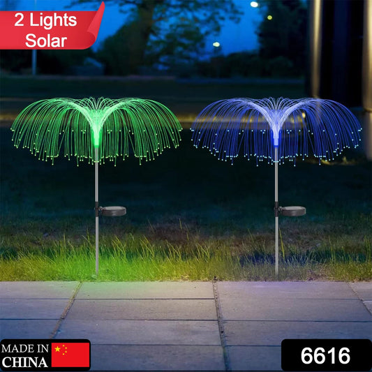 Colorful 7-color solar outdoor lights illuminating garden pathway at night
