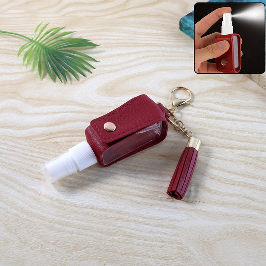 Faux leather hand sanitizer holder keychain featuring elegant tassel