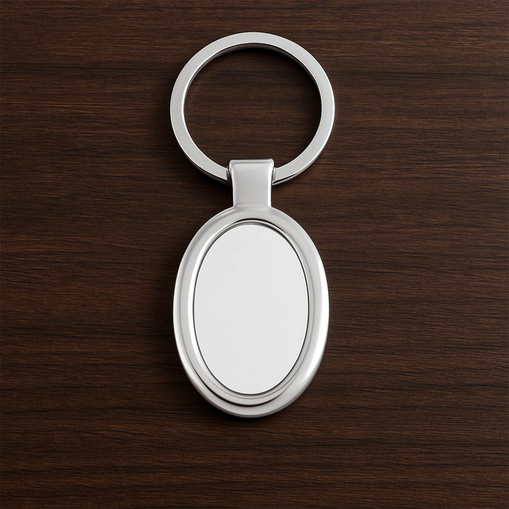 Sleek oval metal keychain showcasing durable build and chrome shine
